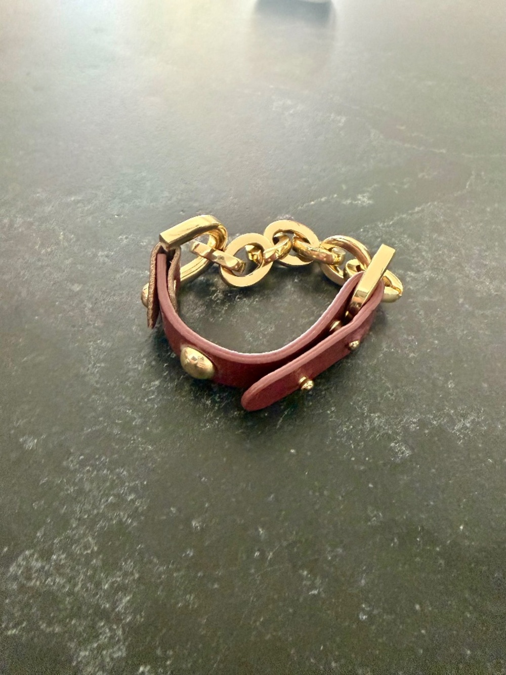 Maroon leather and gold tone curb chain and wrap bracelet